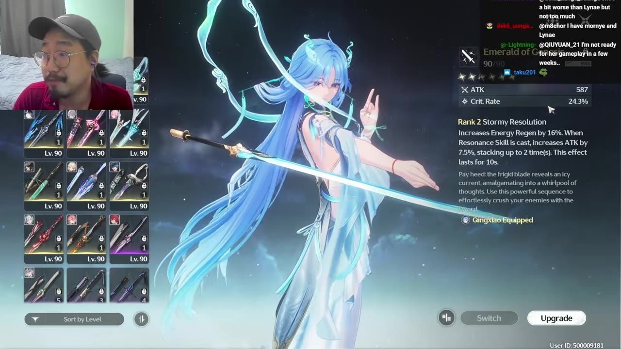 A character equipment screen shows a blue-haired character holding a sword, a weapon grid on the left, and the selected weapon details for Emerald of Genesis on the right.