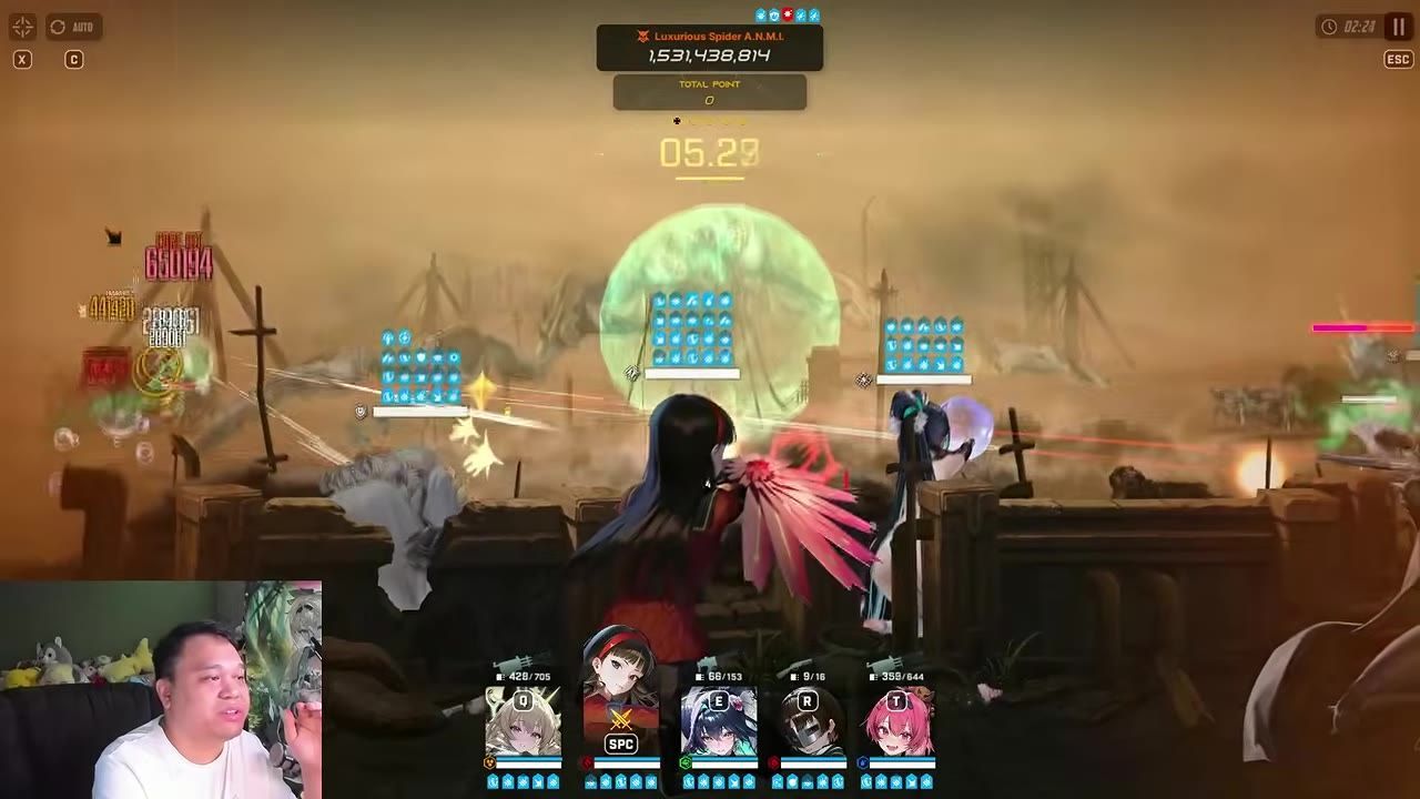 A game battle scene shows a boss protected by a green shield dome in the center with enemy units and combat effects around it, while a streamer webcam overlay appears in the lower left.