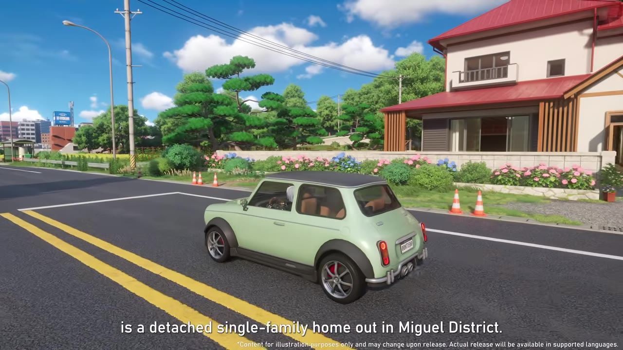 A small light green car drives past a detached house with a red roof on a suburban street.